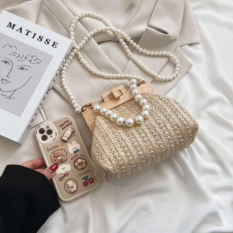 Women's small straw solid color streetwear pearls lock clasp straw bag